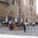 image Barrio_Santa_Cruz_to_River_Seville_Oct._9_2006_1772_Horses_and_buggies_in_front_of_Seville_Cathedral.jpg