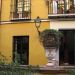 image Las_Casas_de_la_Juderia_Seville_Oct._8_2006_1690_Hotel_restaurant_through_the_black_door.jpg