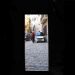image Las_Casas_de_la_Juderia_Seville_Oct._8_2006_1704_Looking_back_through_the_door_into_the_alley.jpg