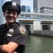 image Midtown_Soho_Battery_Park_etc._7-28_And_8-4-08_3458_NYPD_Officer_on_Ferry-He_Will_Smile_for_Tourists.jpg